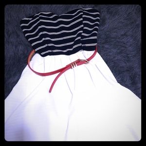 Blue and white strapless dress with red belt